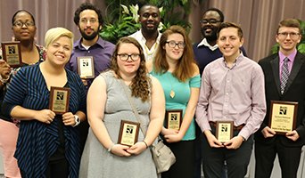 NFCC Dean of Academic Affairs Jennifer Page (Left) and Frances Adleburg (Right) present the 2018 Student of the Year Award to Zackery Peterson 